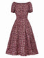 Robe rouge épaules dénudées petites fleurs des années 1940
