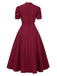 Robe manches bouffantes à col en V unie années 1950