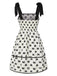Robe smockée crème à bretelles et nœud papillon des années 1950