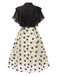 Robe trapèze noire à volants roses dorées col montant années 1950