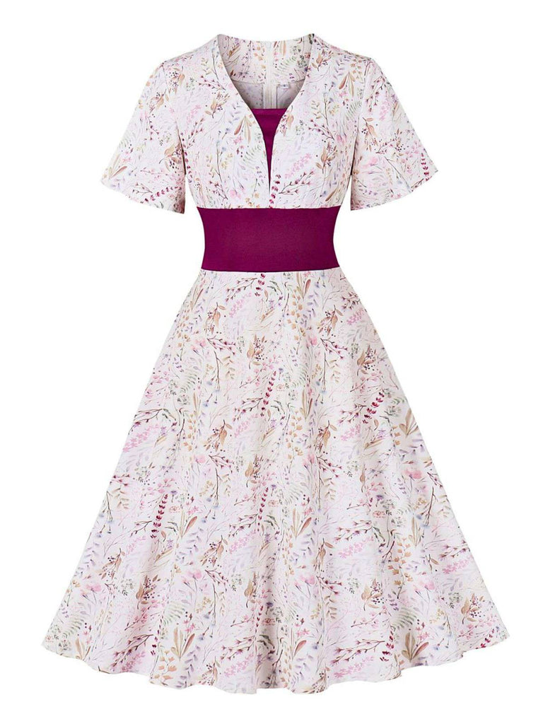 Robe fleurie manches cloche et décolleté en cœur Rose Viole des années 1950