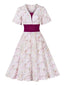 Robe fleurie manches cloche et décolleté en cœur Rose Viole des années 1950