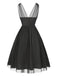 Robe trapèze noire fleurie en dentelle et maille années 1950