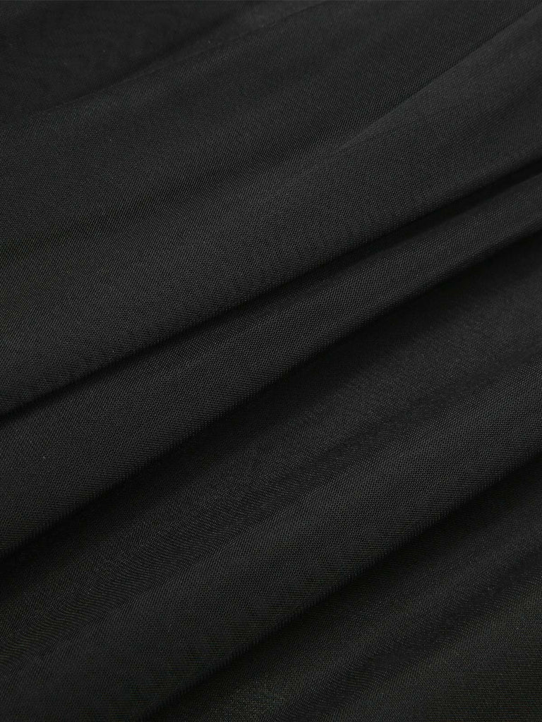 Robe trapèze noire fleurie en dentelle et maille années 1950