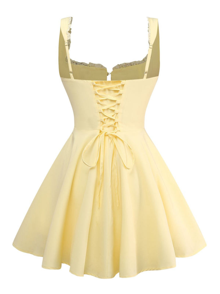 Robe patineuse dentelle à lacets et bretelles années 1960