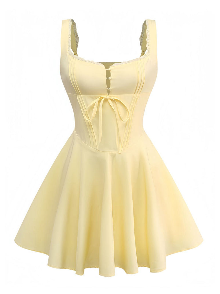 Robe patineuse dentelle à lacets et bretelles années 1960