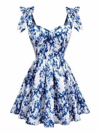Robe patineuse bleue à fleurs et épaules nouées années 1960