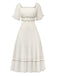 Robe abricot à col carré et bordure texturée années 1930