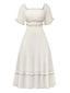 Robe abricot à col carré et bordure texturée années 1930