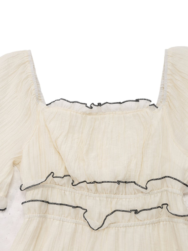 Robe abricot à col carré et bordure texturée années 1930