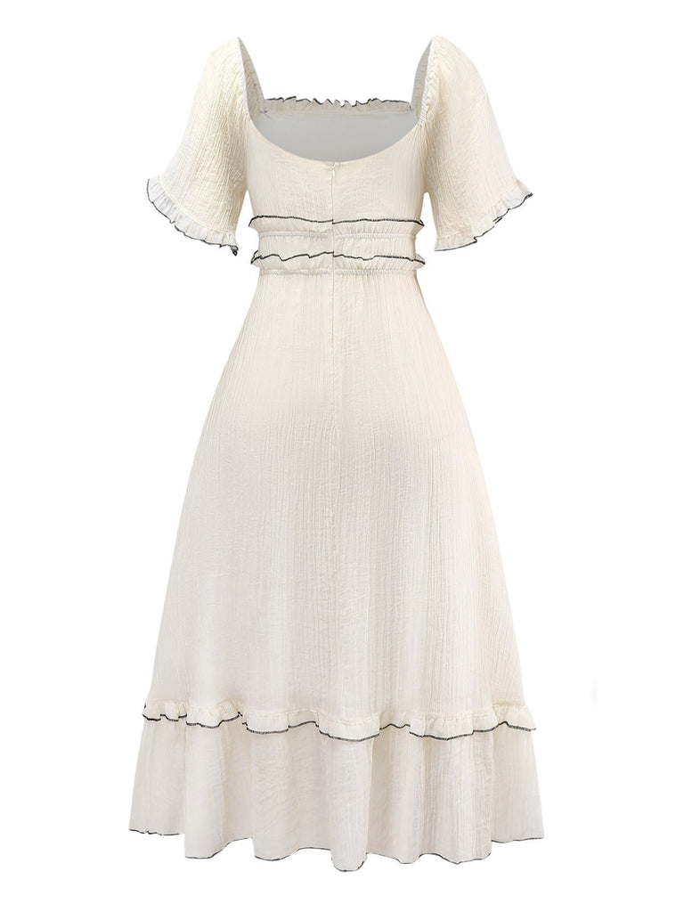 Robe abricot à col carré et bordure texturée années 1930