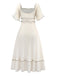 Robe abricot à col carré et bordure texturée années 1930