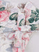 Robe trapèze rose motif fleurs et col en cœur des années 1950