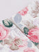 Robe trapèze rose motif fleurs et col en cœur des années 1950