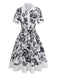 Robe chemise noire blanc à fleurs et ceinture des années 1940