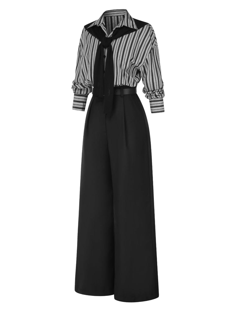 Combinaison noire à rayures et col chemise des années 40 avec cape