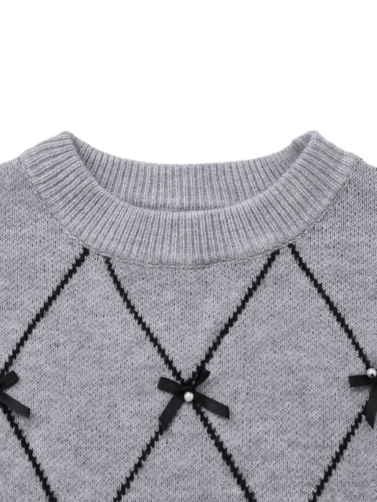 Pull-over gris à col rond et nœud papillon années 1950