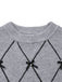 Pull-over gris à col rond et nœud papillon années 1950