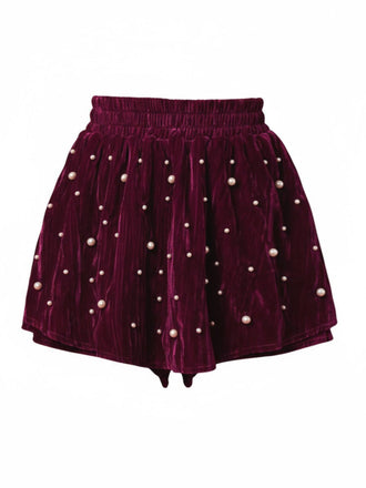 Short en velours rouge orné de perles des années 1950