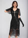 Robe Charleston à paillettes et pompons col rond années 1920