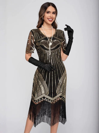 Robe Charleston à paillettes et pompons col rond années 1920