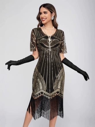 Robe Charleston à paillettes et pompons col rond années 1920