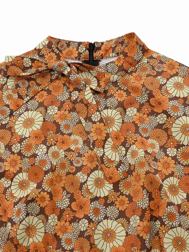 Combinaison orange col noué en velours côtelé motif marguerites années 1970