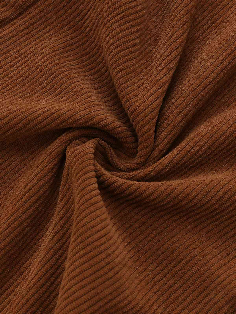 Combinaison orange col noué en velours côtelé motif marguerites années 1970