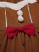 Robe en peluche bonhomme en pain d'épice couleur curcuma des années 1950