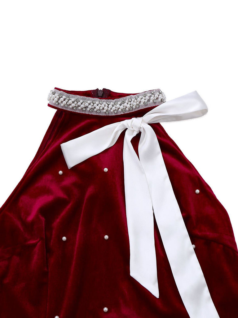 Robe de Noël rouge à franges de perles années 1960