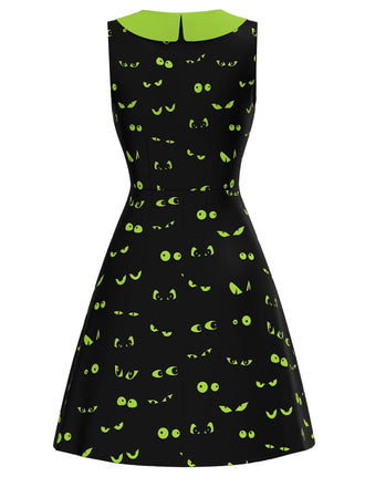 Robe noire avec yeux de démon Halloween années 1960