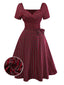 Robe rouge à carreaux col cœur froncée et nœud des années 50
