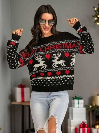 Pull noir motifs de cœurs et de rennes Joyeux Noël des années 1930