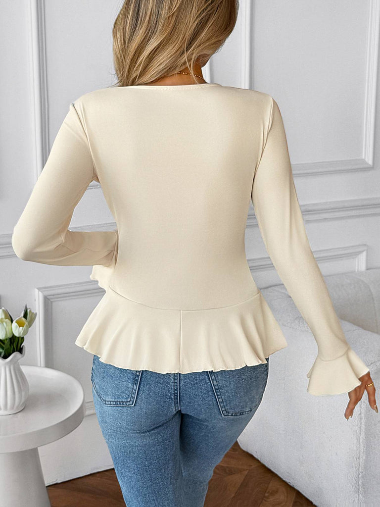 Haut beige uni à col à revers et volants années 1950