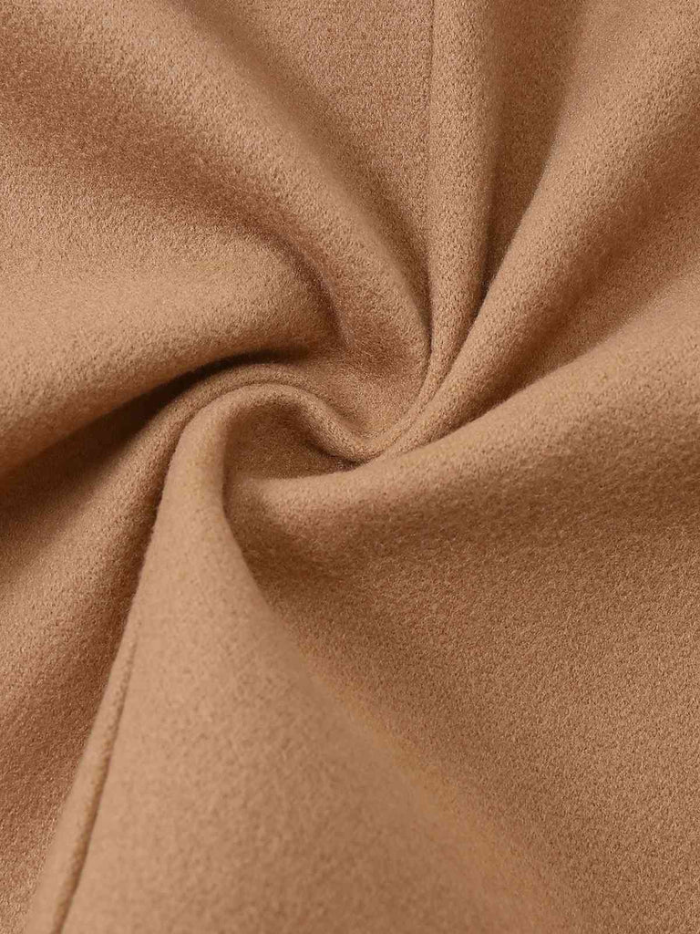 Veste cape à col roulé ceinturée unie années 1970