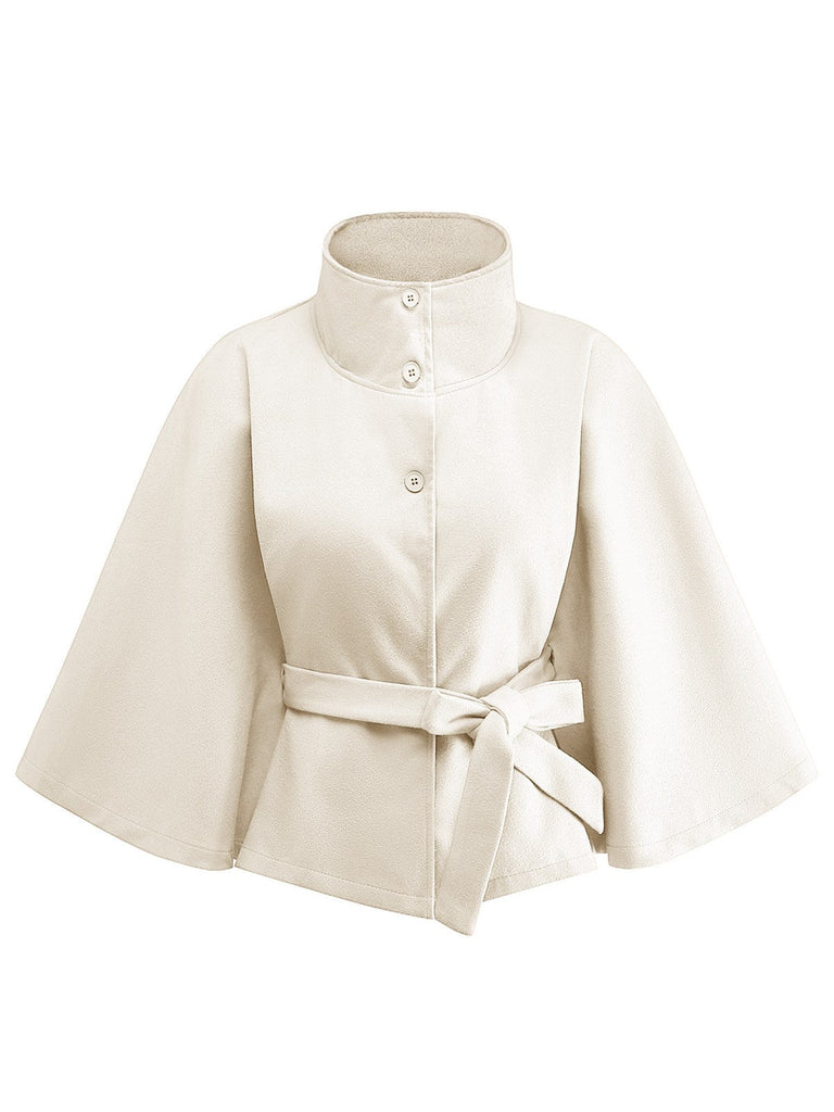Veste cape à col roulé ceinturée unie années 1970