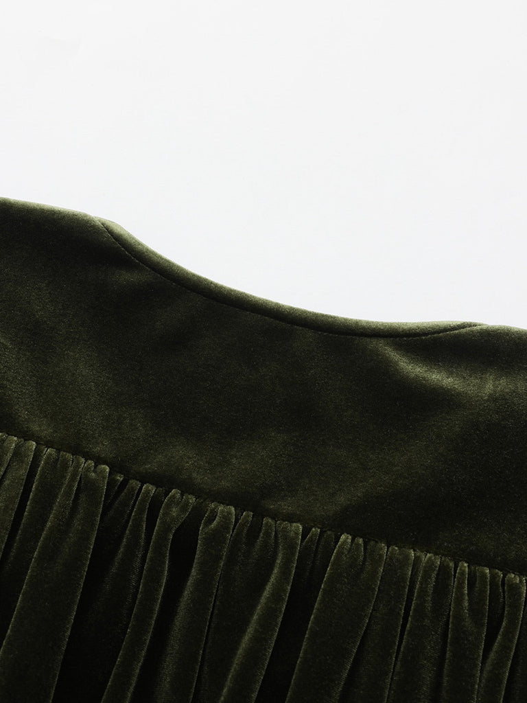 Robe verte en velours manches bouffantes col en V profond et froncées des années 1940