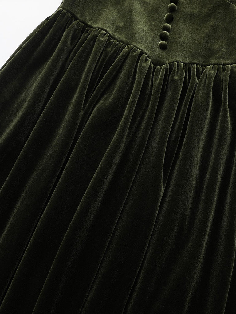 Robe verte en velours manches bouffantes col en V profond et froncées des années 1940