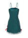 Robe verte à paillettes avec nœud et clochettes de Noël des années 1960