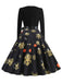 Robe noire à ceinture ruban flocon de neige années 1950