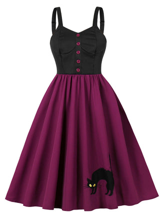 Robe trapèze motif chat larges bretelles rouge violacé des années 1950