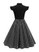 Robe noire trapèze à pois col nœud manches cape années 1950