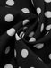 Robe noire trapèze à pois col nœud manches cape années 1950