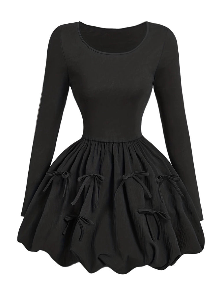 Robe patineuse noire nœuds papillon manches fines années 70