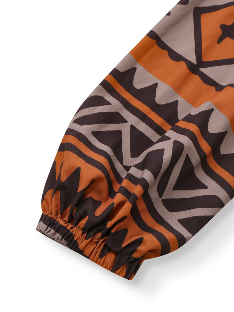 Robe bohème marron à imprimé tribal et décolleté en V profond style années 1970