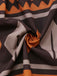 Robe bohème marron à imprimé tribal et décolleté en V profond style années 1970