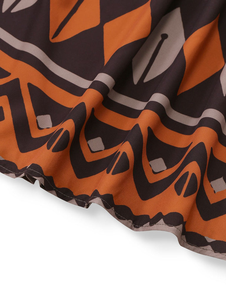 Robe bohème marron à imprimé tribal et décolleté en V profond style années 1970