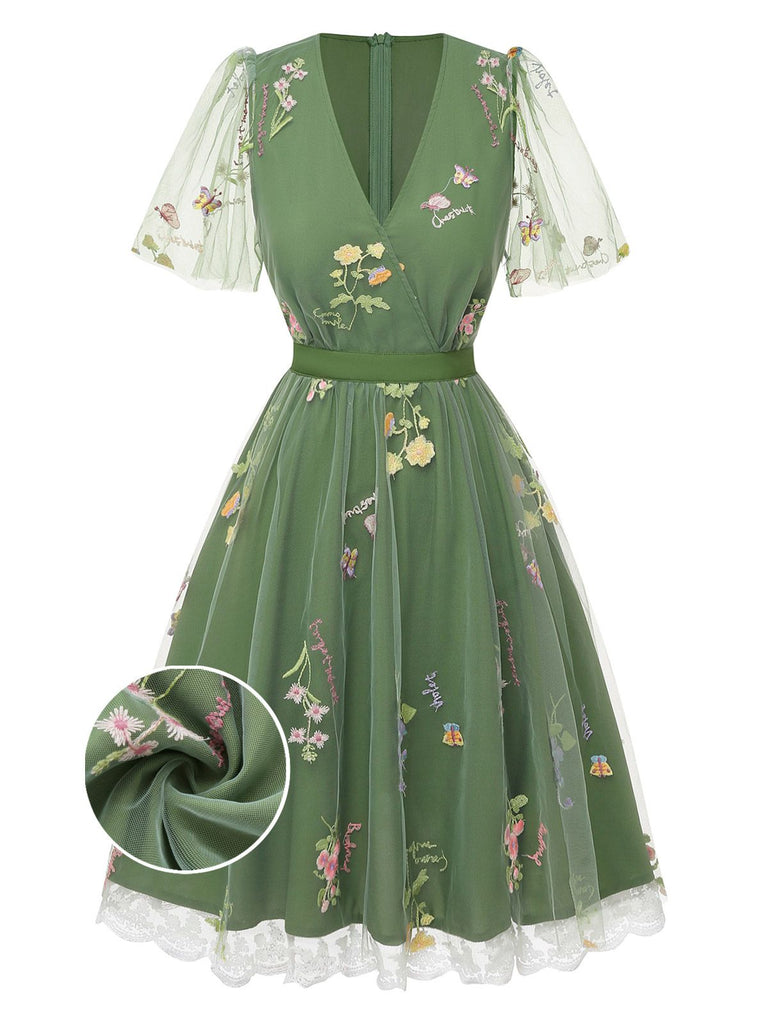 Robe verte manches bouffantes et broderies florales en résille années 50