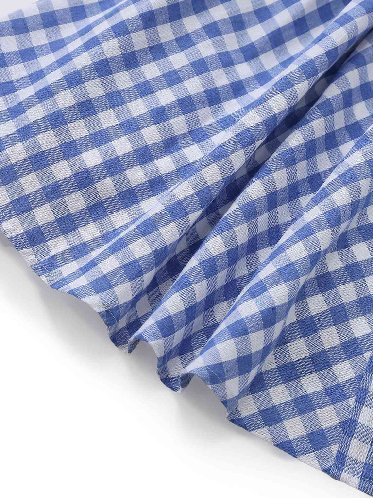 Robe empire bleue à carreaux vichy bretelles nouées sur les épaules années 1960