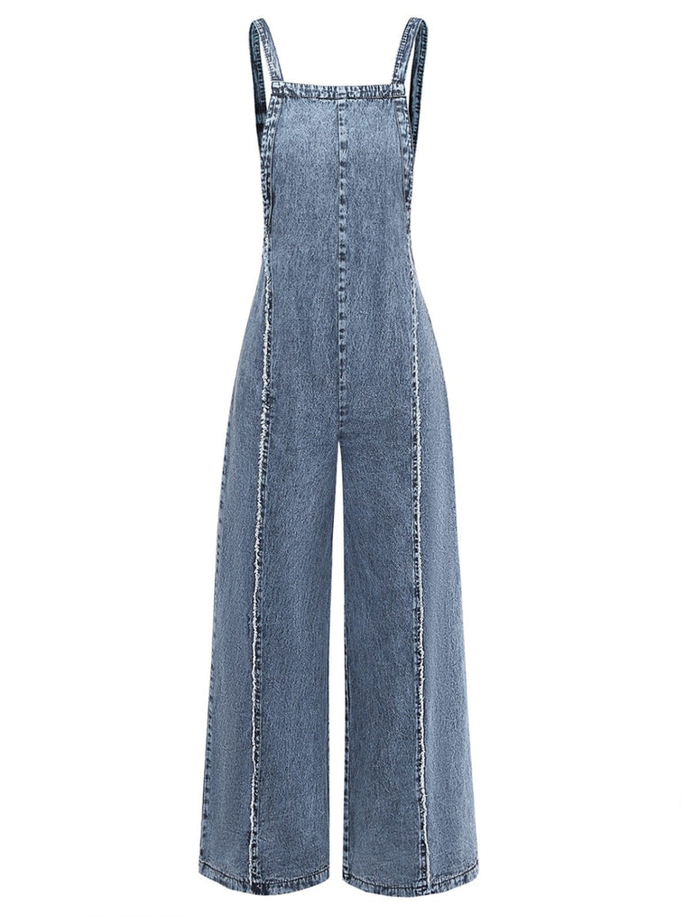 Salopette en jean bleu large effilochée années 1970